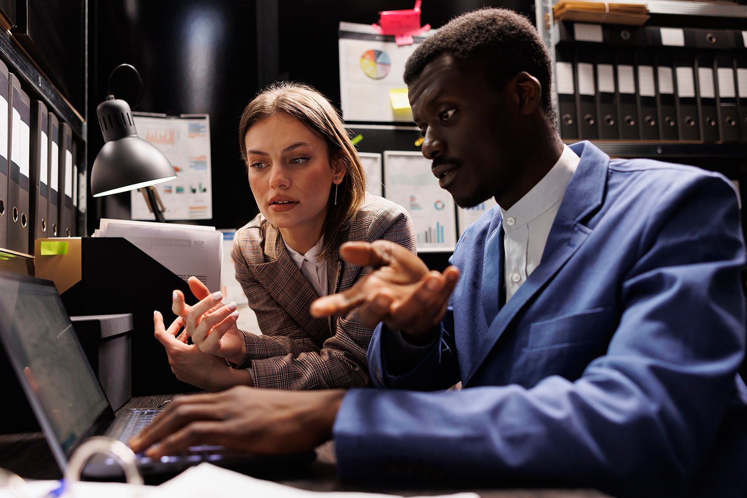 Compliant cloud infrastructure under review by government IT administrator. Compliant cloud infrastructure under review by government IT administrator.